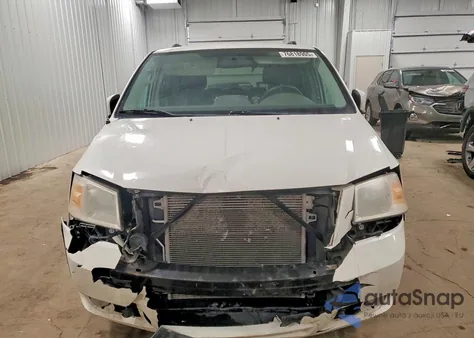 2010 Dodge Grand Caravan Sxt z USA, uszkodzony, nr VIN 2D4RN5D19AR459630